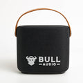 Bull Audio Retro black portable speaker, front view, with a tan carry handle and logo